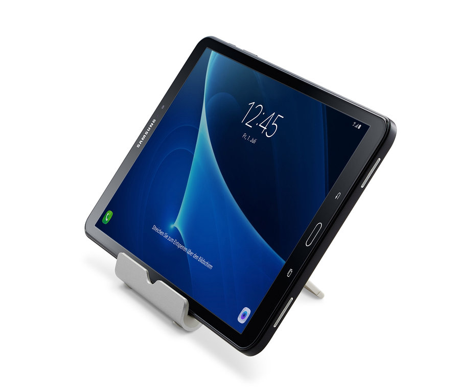 Černý tablet je opřený o Stojánek na smartphone a tablet.