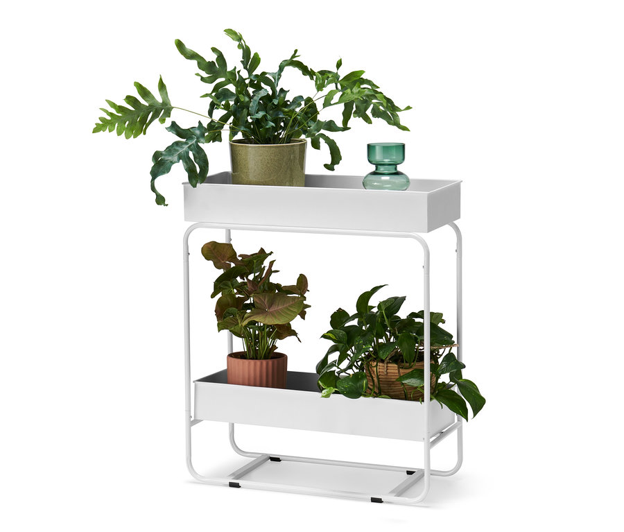 Dvoupatrový bílý box na pěstování s rostlinami v květináčích.