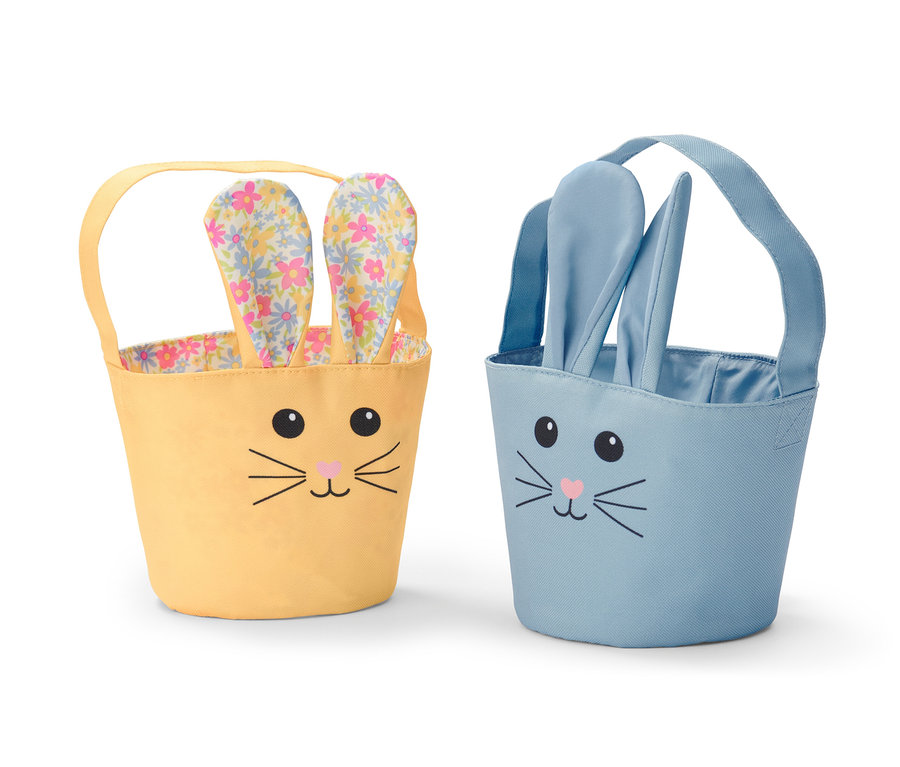 Dva košíky na sbírání velikonočních vajec: žlutý s květinovými ušima a modrý s modrýma ušima.