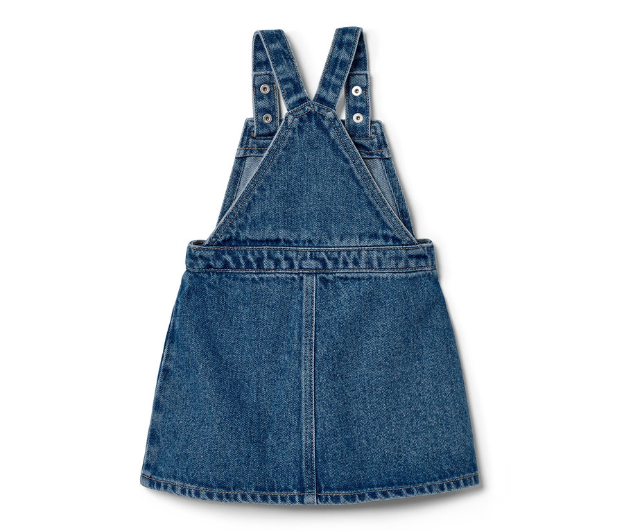 Dětská kombinéza z denimu s laclem a nastavitelnými ramínky.