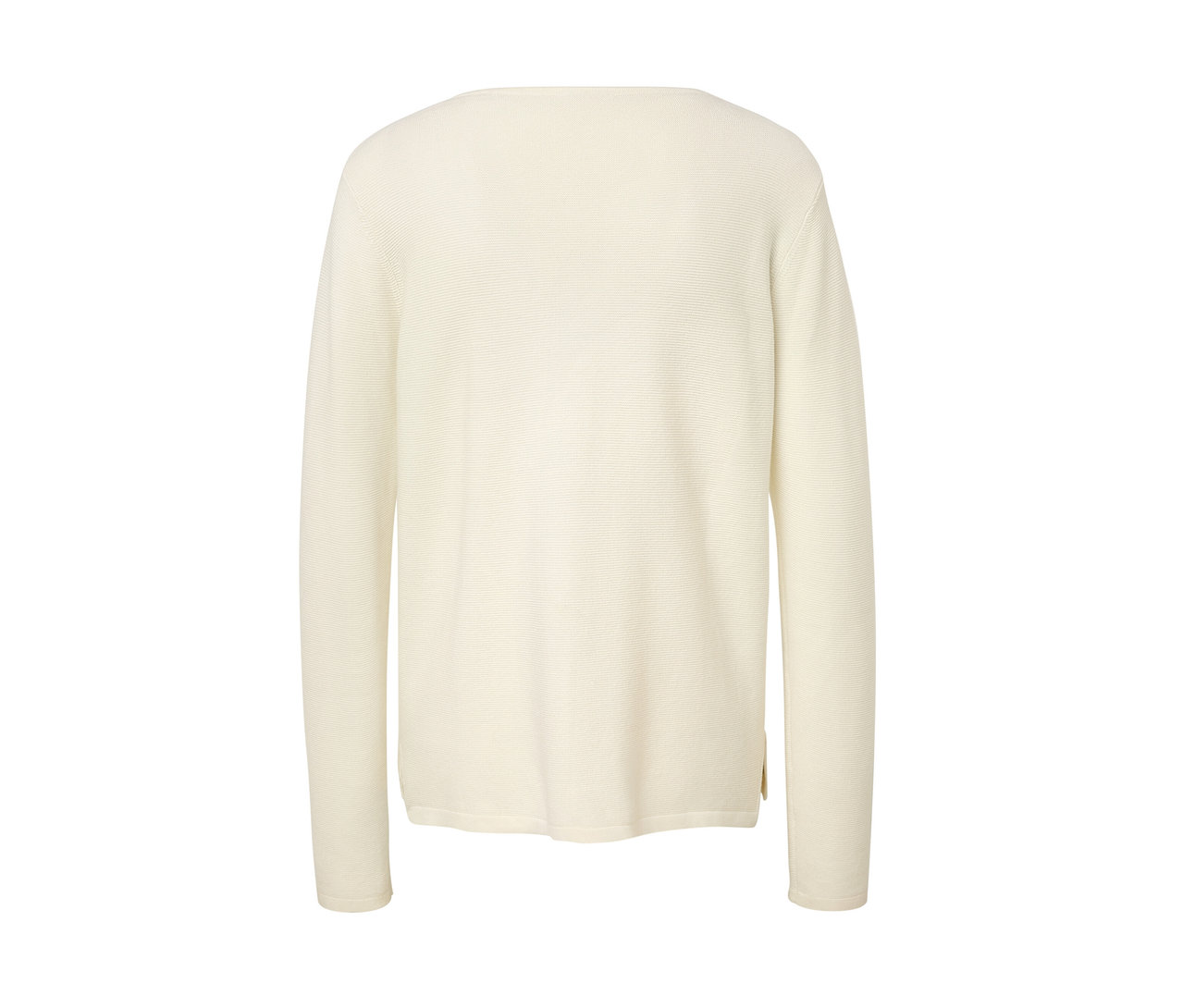 Krémově bílý pletený svetr.