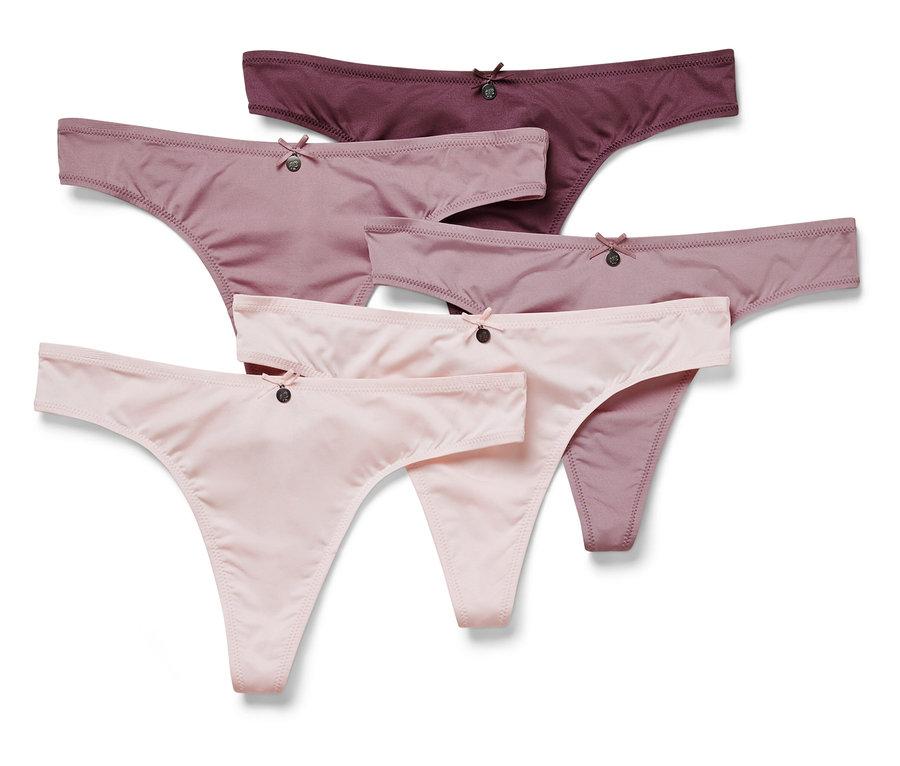 Pětice dámských tang v odstínech růžové a fialové barvy, uspořádaných na bílém pozadí.