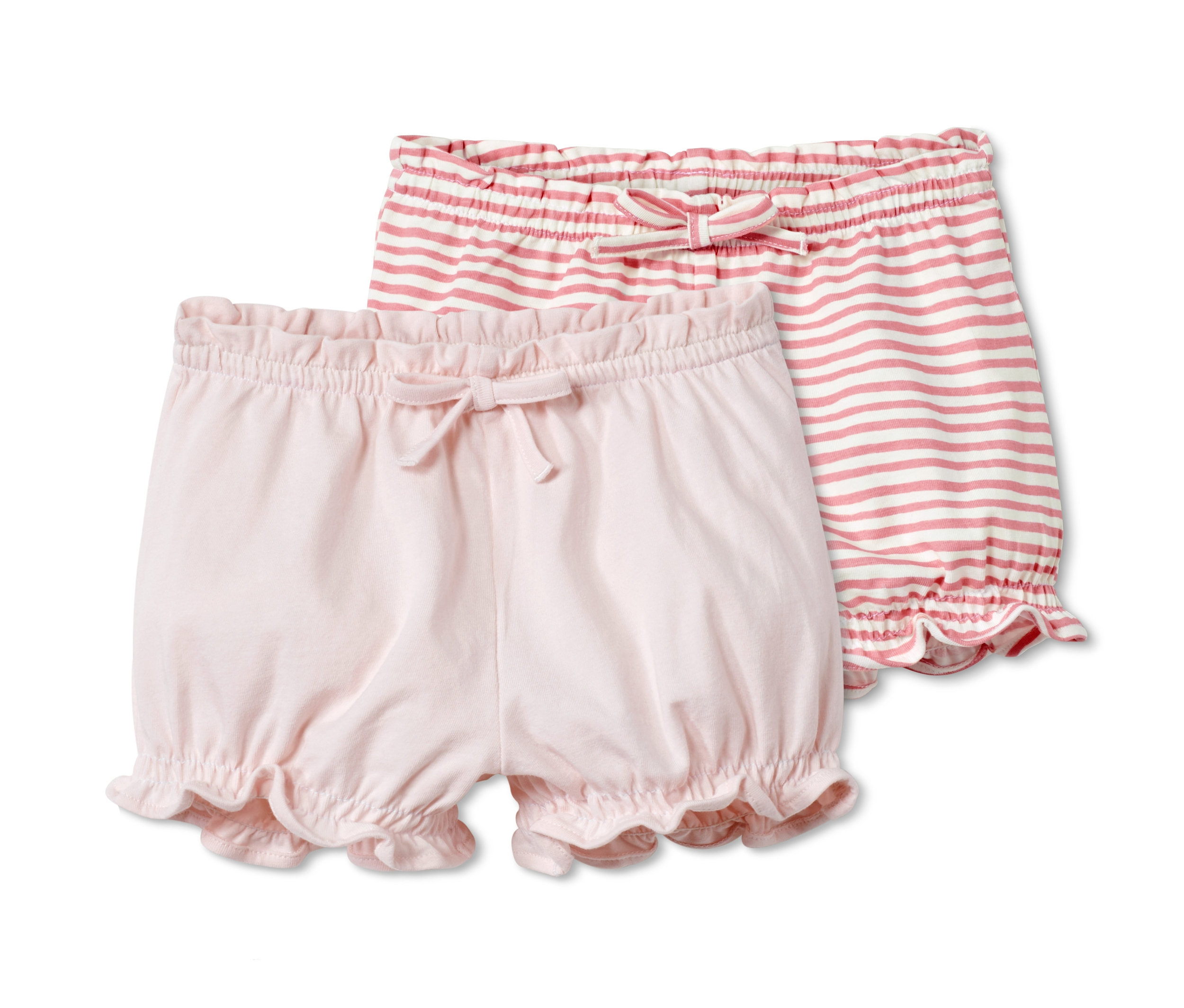 Dvoje dětské bavlněné šortky: jedny růžové a jedny s růžovými a bílými pruhy.