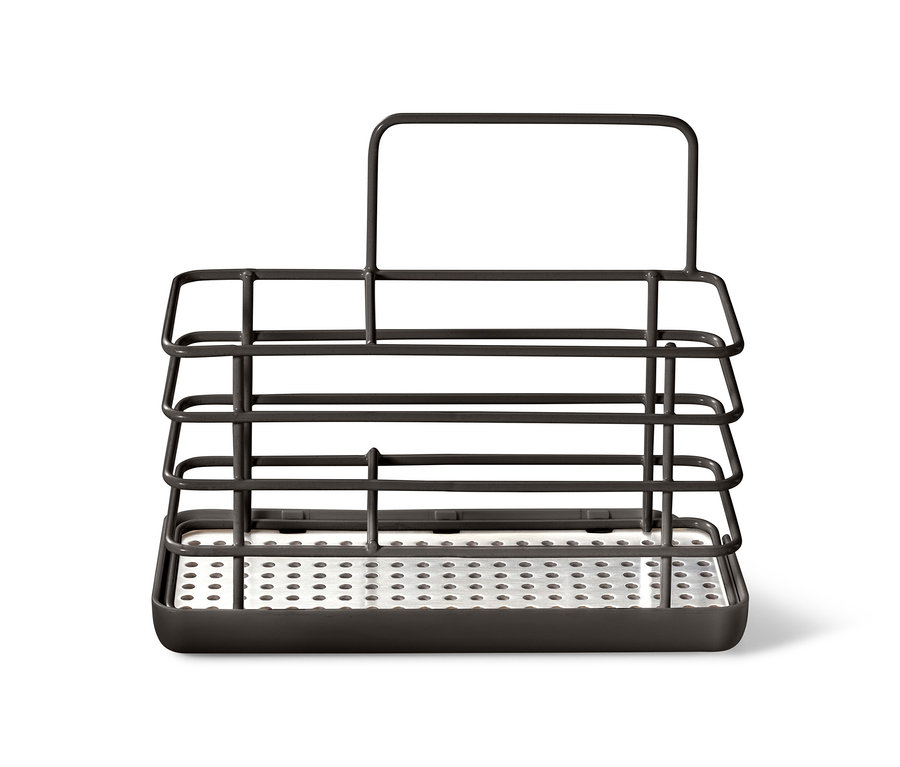 Kovový stojan na mycí potřeby.