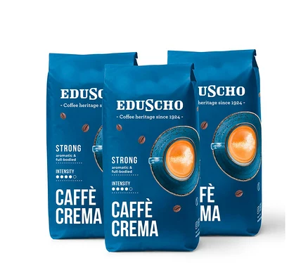 Tři balení Eduscho Caffè Crema Strong zrnkové kávy.