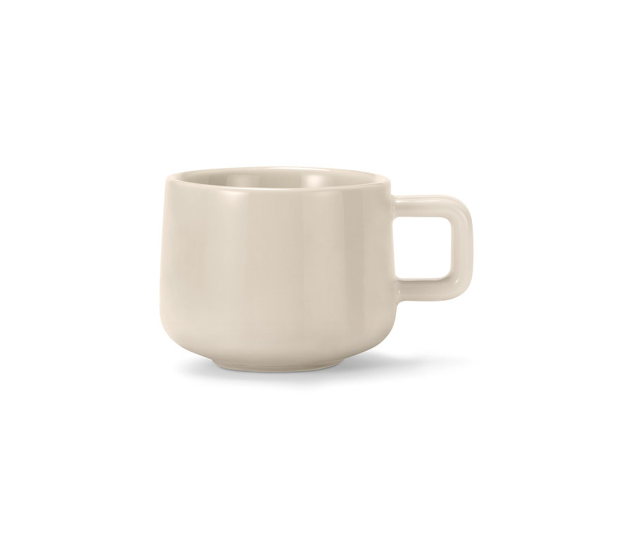 Světle béžový šálek na espresso s uchem.