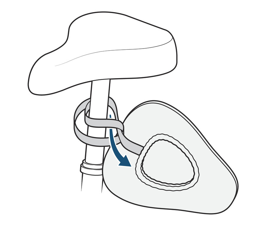 Nákres znázorňuje potah na cyklistické sedlo upevněný na sedle.