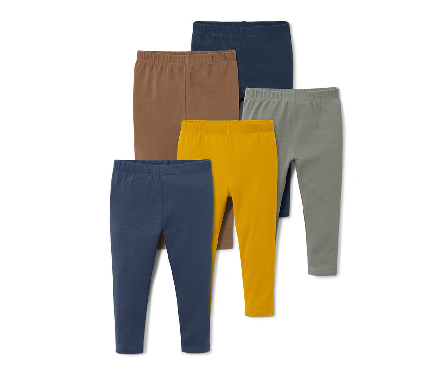 Pět párů džerzejových legín různých barev.