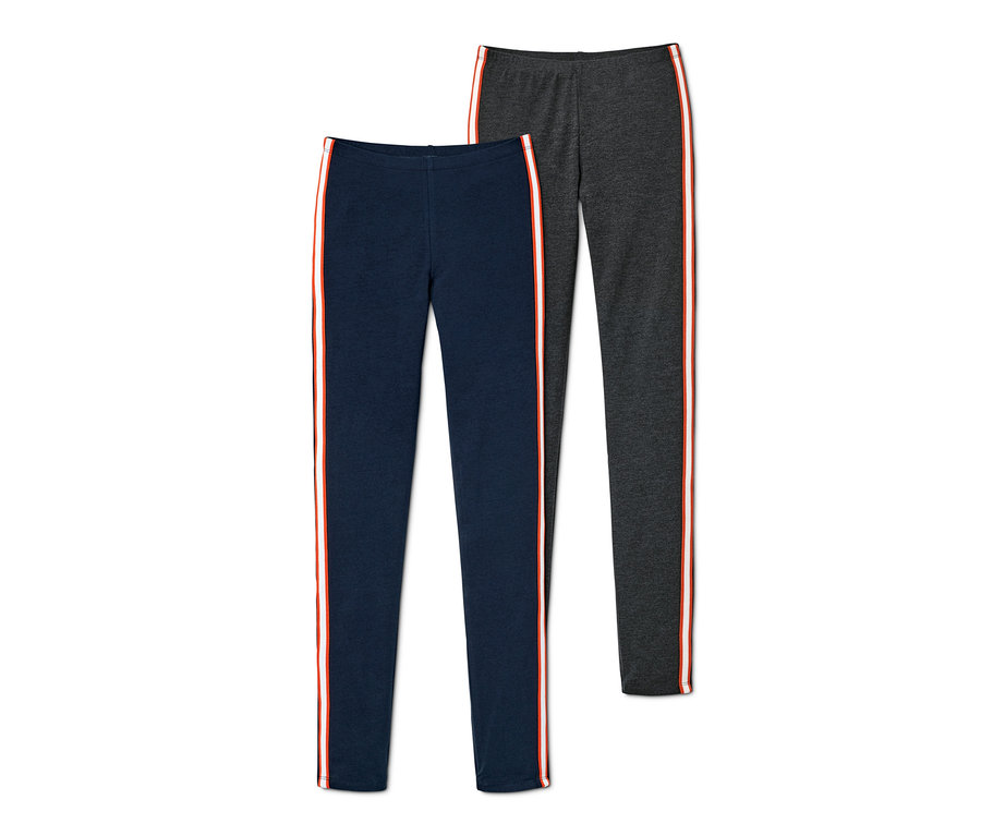 Dvoje legíny: jedny tmavě modré a jedny antracitové, oboje s červeno-bílým pruhem po straně.