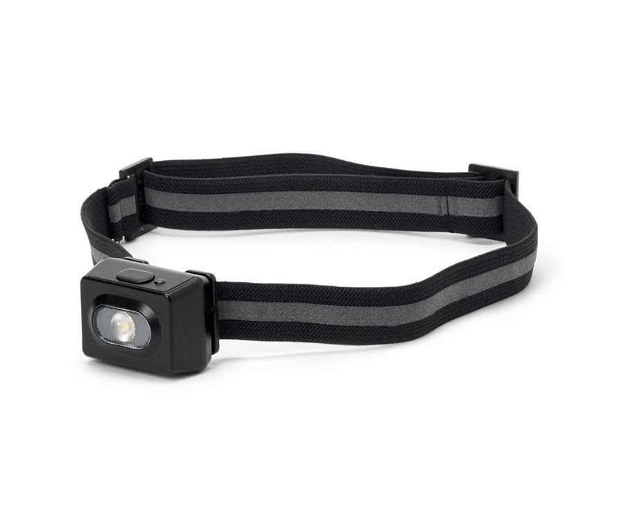 Čelovka s černým pouzdrem a šedým pruhovaným popruhem.