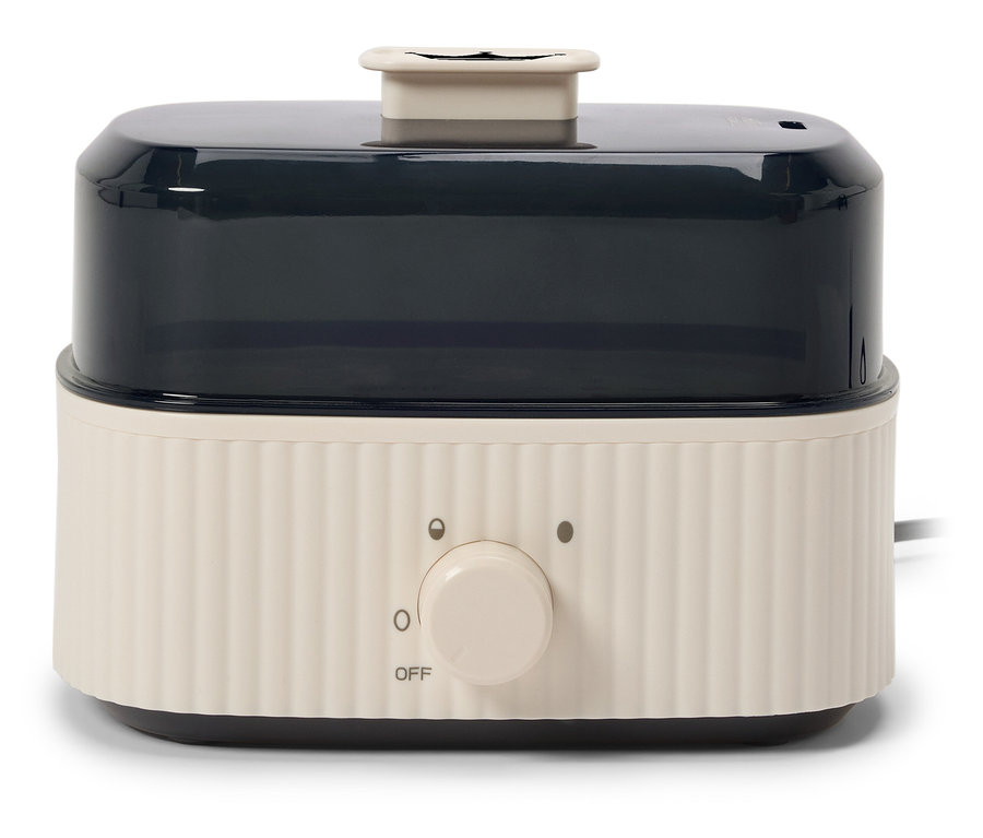 Bílý parní hrnec s černou průhlednou nádobou a otočným ovladačem.