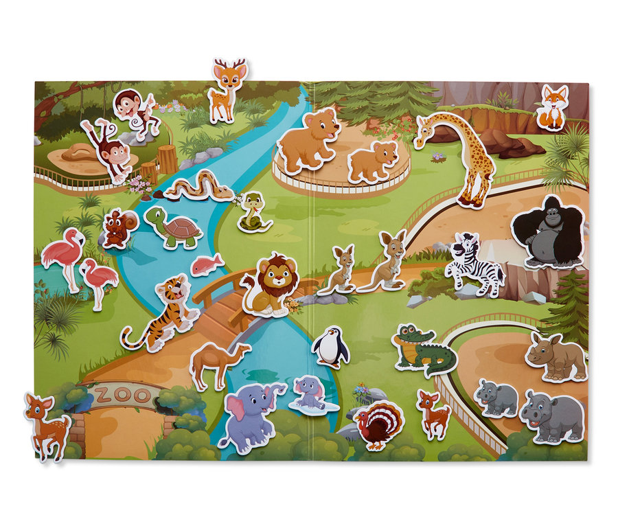 Otevřená magnetická knížka s ilustrací ZOO a magnetkami zvířat.