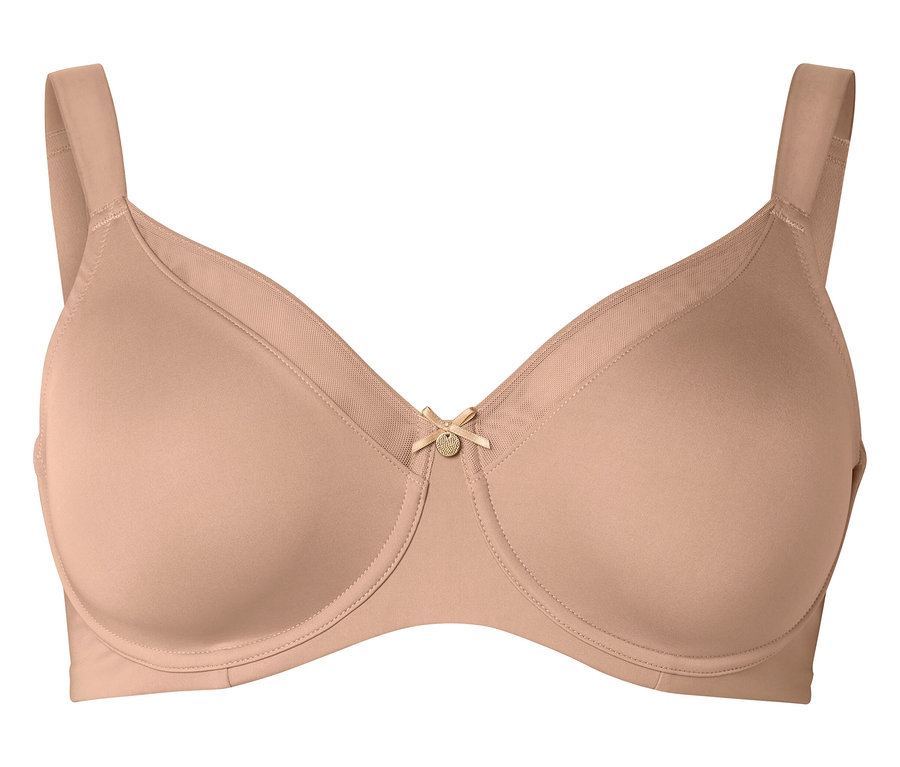 Detailní záběr tělové podprsenky s kosticemi a malým detailem mašle uprostřed.