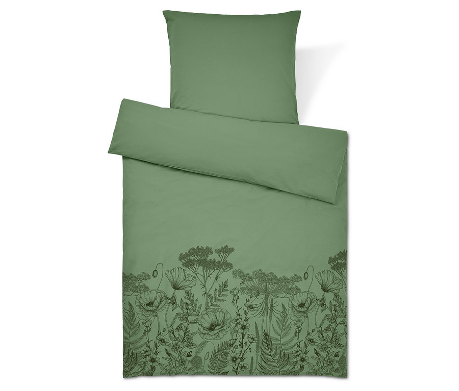 Zelené povlečení s květinovým vzorem. Polštář nahoře.