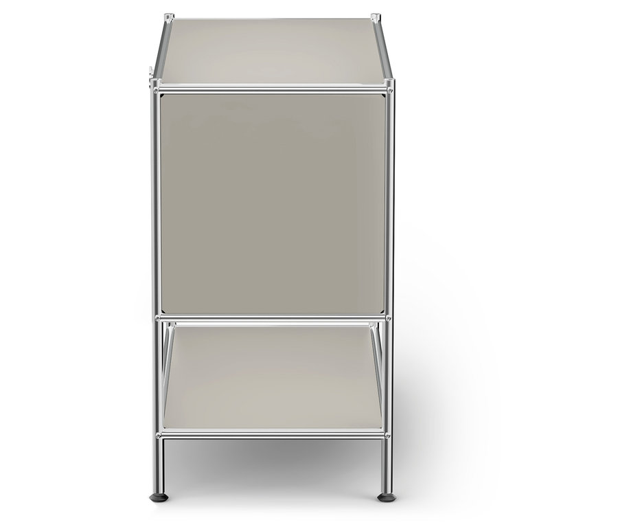 Béžový policový modul se stříbrným rámem na bílém pozadí.