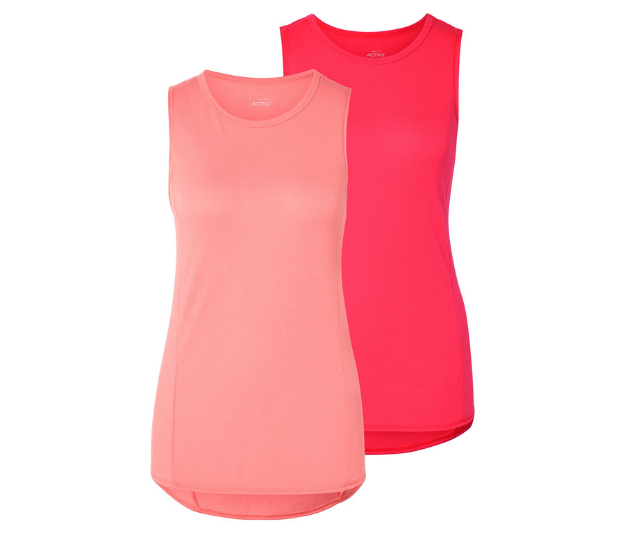Dva dámské topy bez rukávů, jeden růžový a jeden růžový, leží vedle sebe.