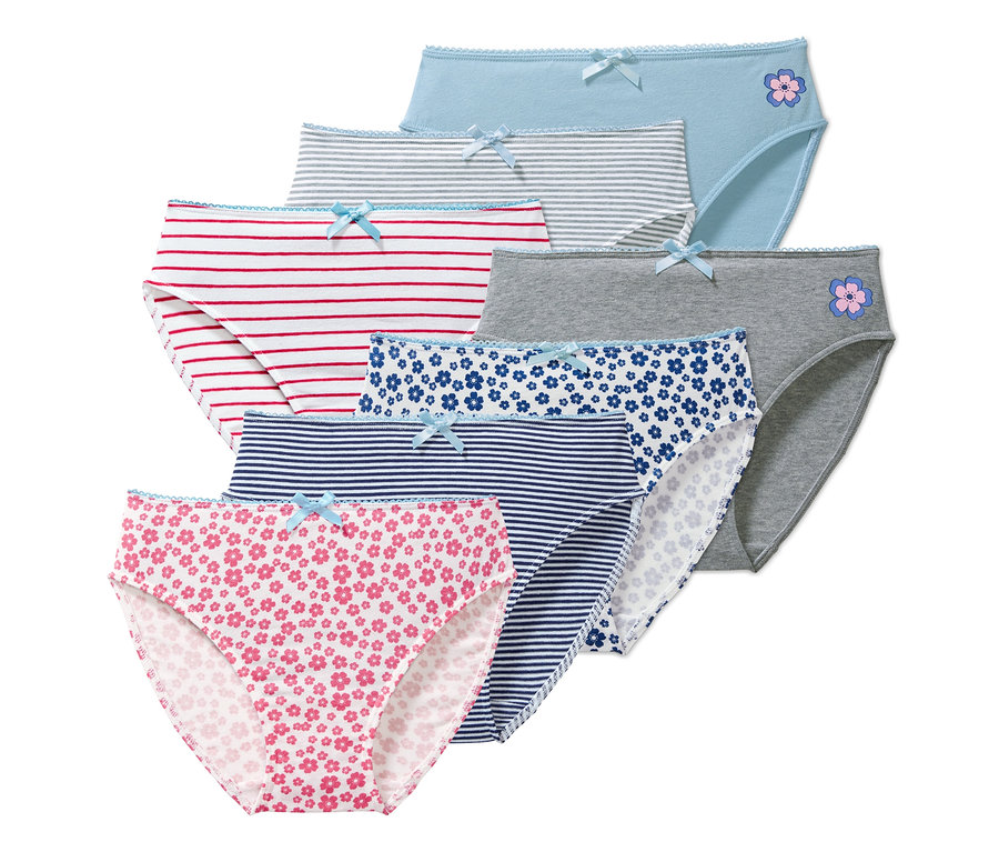 Sada sedmi kalhotek různých barev a vzorů, včetně květinových a proužkovaných.