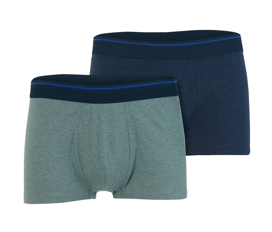 Dvoje pánské boxerky: jedny zelené a jedny tmavě modré.