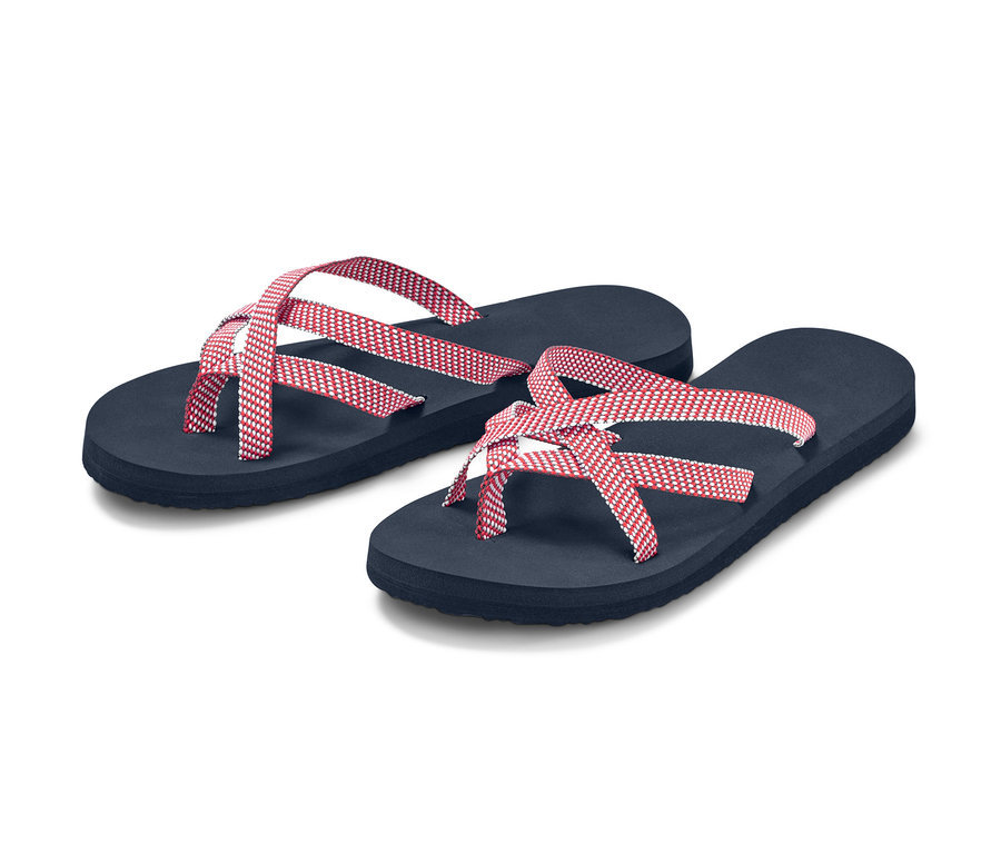 Dva modré žabky s červenými a bílými pásky.