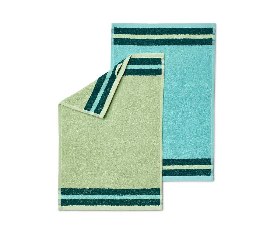 Dva kuchyňské ručníky: jeden světle zelený, druhý tyrkysový.
