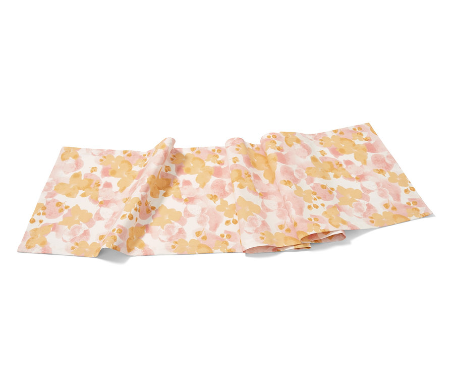 Běhoun na stůl s květinovým vzorem v růžové a žluté barvě.