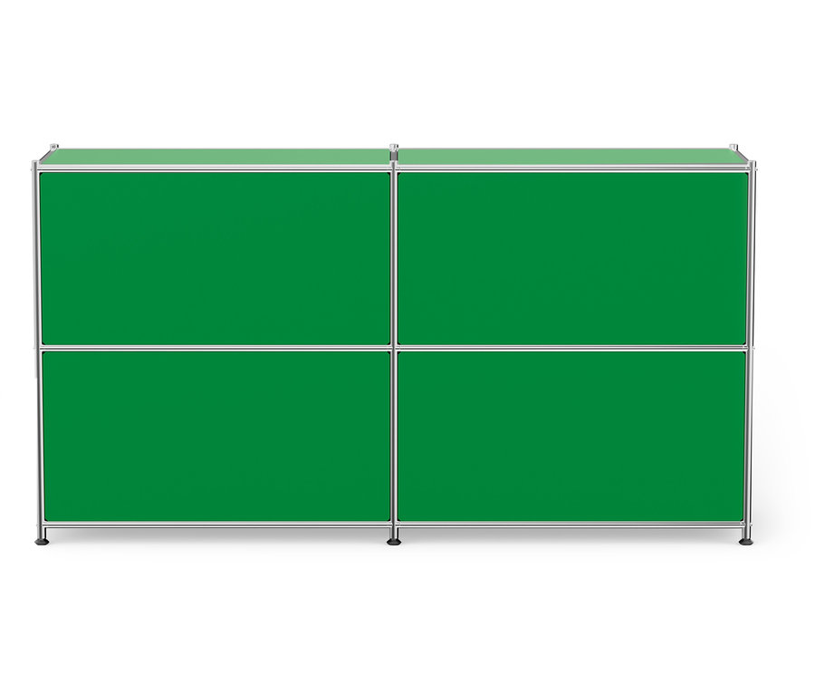 Zelená modulární skříňka se čtyřmi přihrádkami a stříbrným rámem.