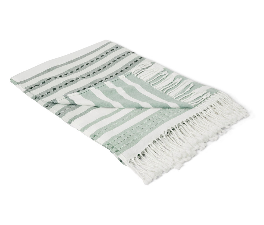 Skládaný pléd s bílými a zelenými pruhy.