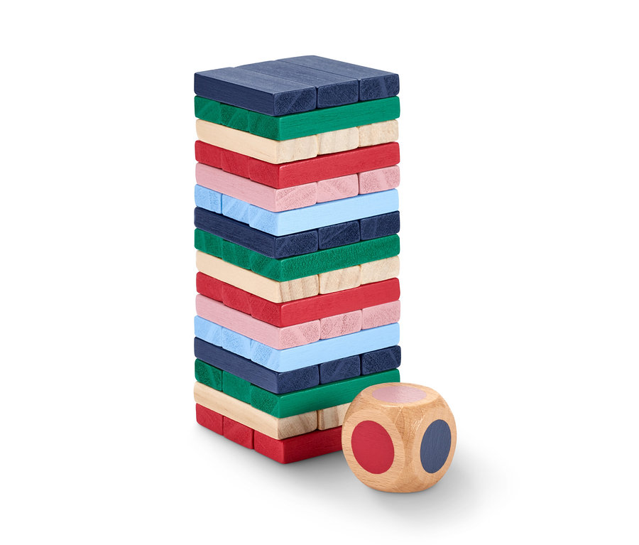 Skládací minivěž z barevných dřevěných kvádrů a hrací kostka.