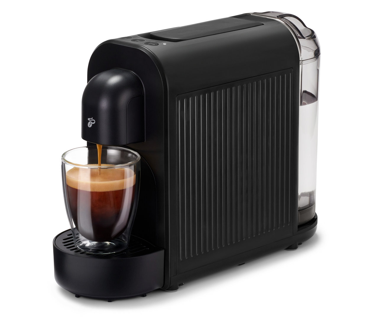 Černý kávovar Cafissimo now black plní kávu do sklenice.