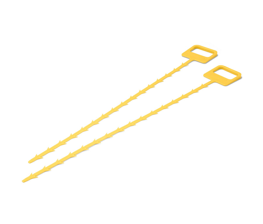 Dvě žluté tyčinky na čištění odpadů.