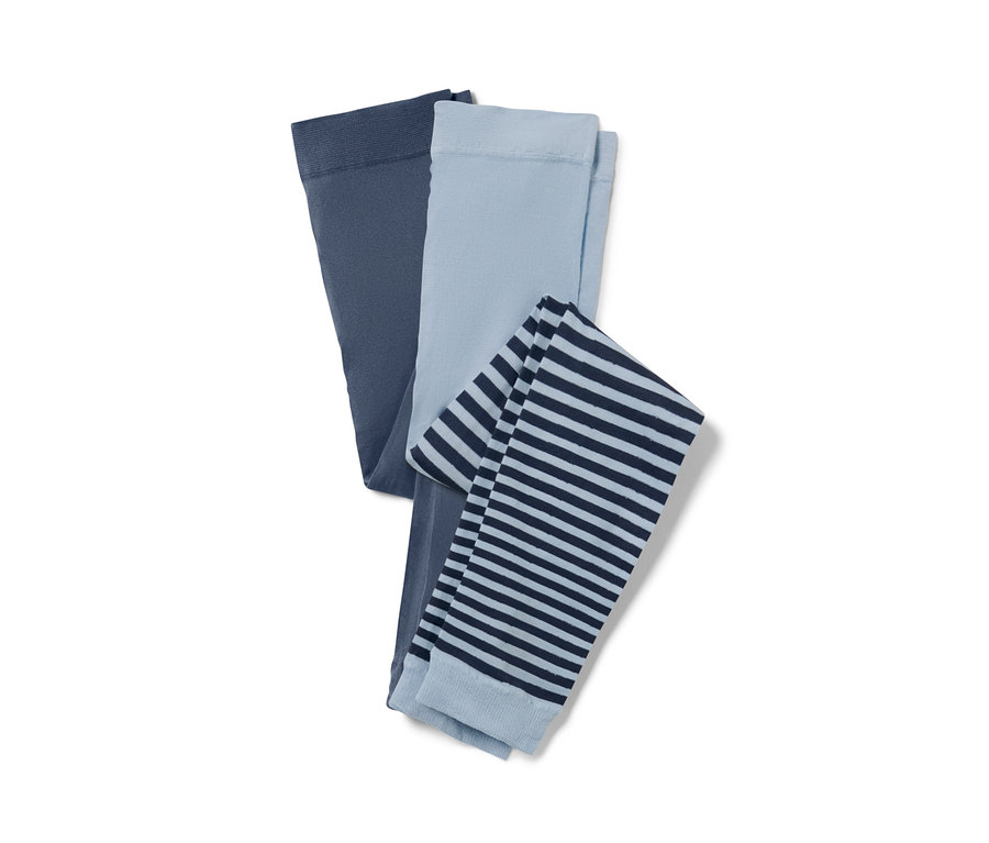 Dvoje dětské jemné punčochové legíny: jedny tmavě modré, druhé světle modré s tmavě modrými pruhy.