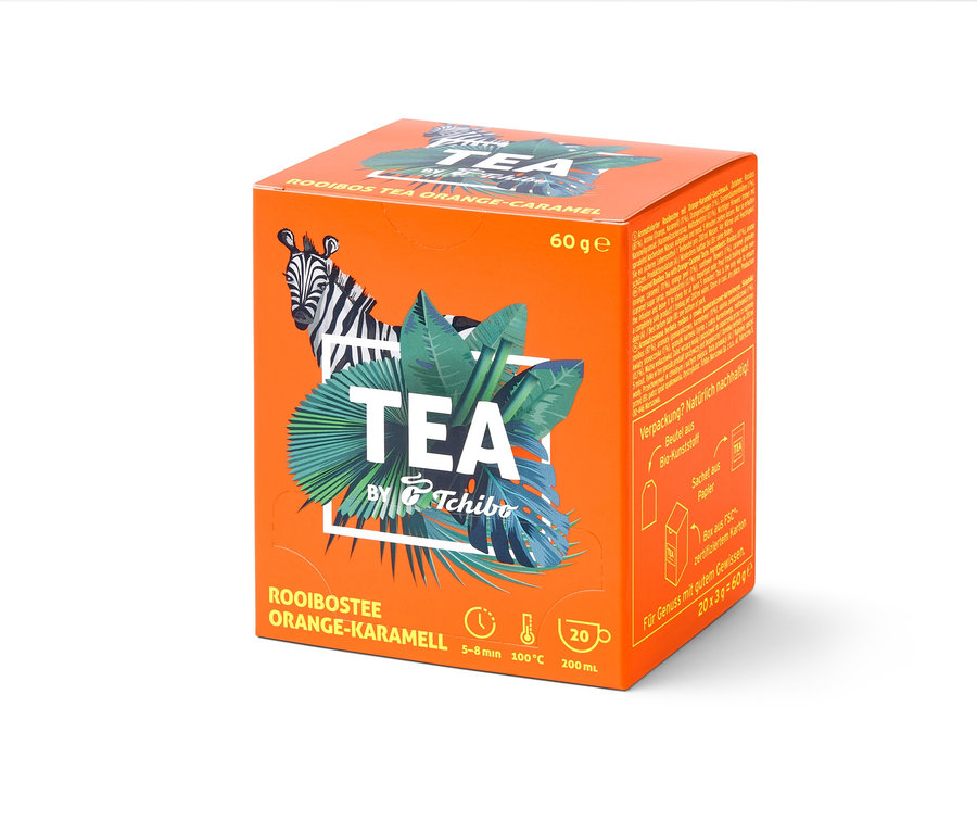 Oranžová krabička čaje Rooibos TEA by Tchibo s příchutí pomeranč/karamel – 8 × 20 nálevových sáčků.