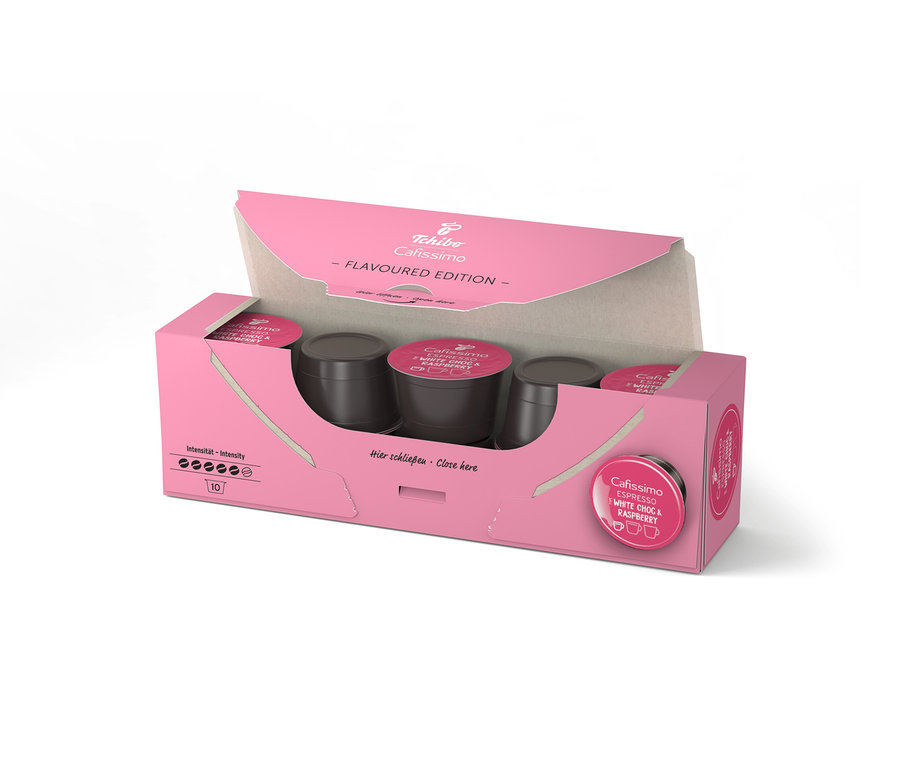 Otevřené růžové balení Cafissimo Flavoured Espresso – White Choc & Raspberry s deseti kapslemi uvnitř.
