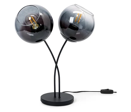 Černá stolní lampa se dvěma skleněnými stínidly ve tvaru koule.