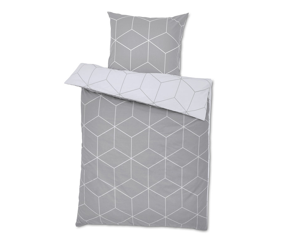 Šedé povlečení renforcé se vzorem krychlí.
