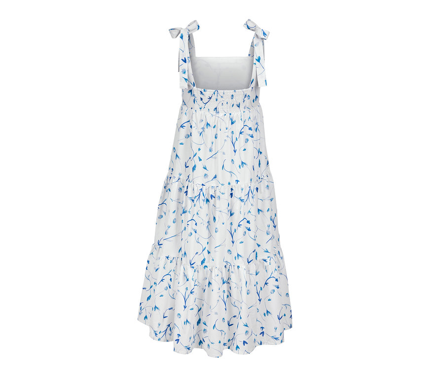 Detail tkaných šatů s potiskem.