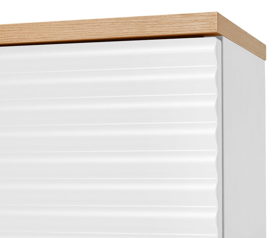 Detail konzolové skříňky se zásuvkou.