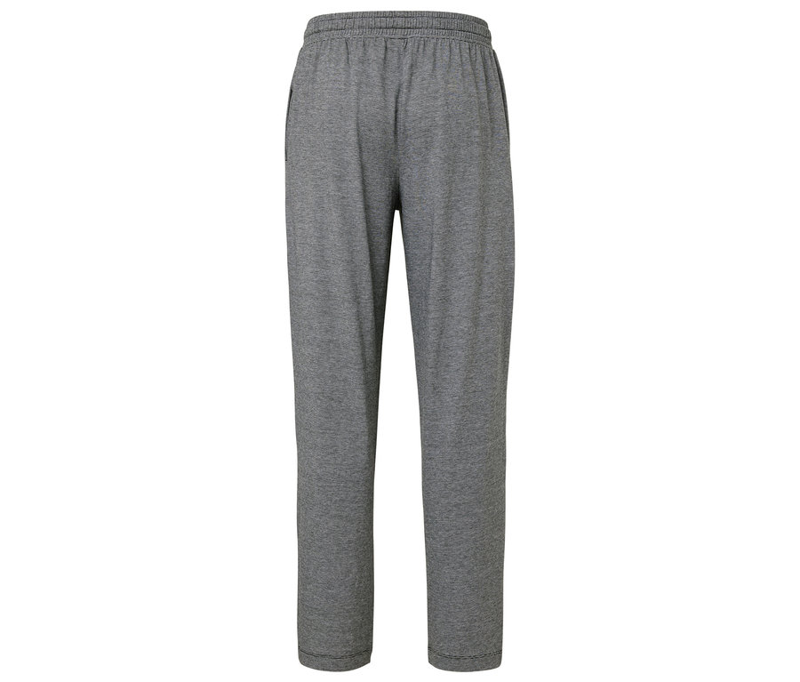 Šedé tepláky se stahovací šňůrkou v pase.