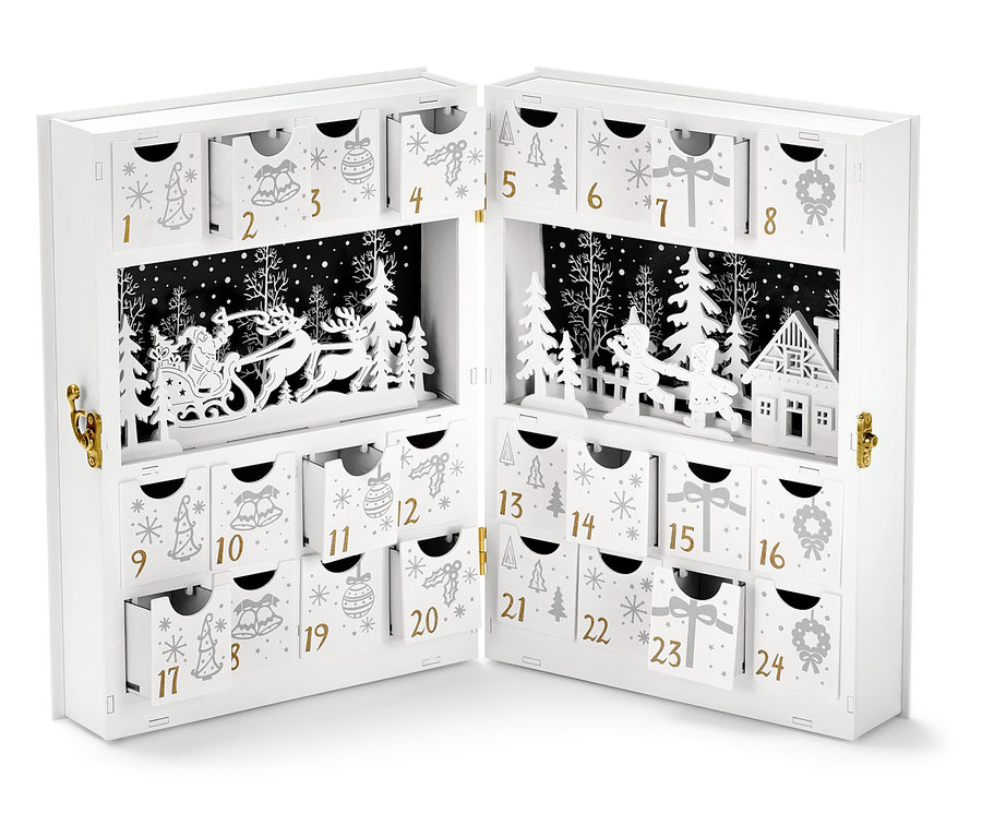 Otevřený bílý adventní kalendář s LED s černou papírovou scenérií sáněk tažených soby.