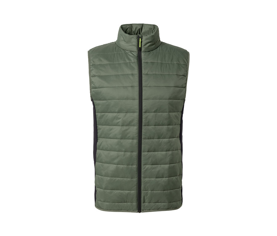 Zelená prošívaná vesta »pack light« s černým zipem uprostřed.