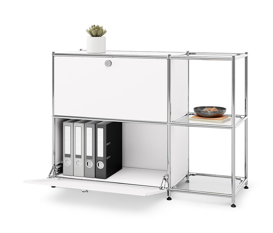 Bílá kovová odkládací skříňka »CN3« se 2 výklopnými dvířky, uvnitř jsou šanony. Nahoře je rostlina v květináči.