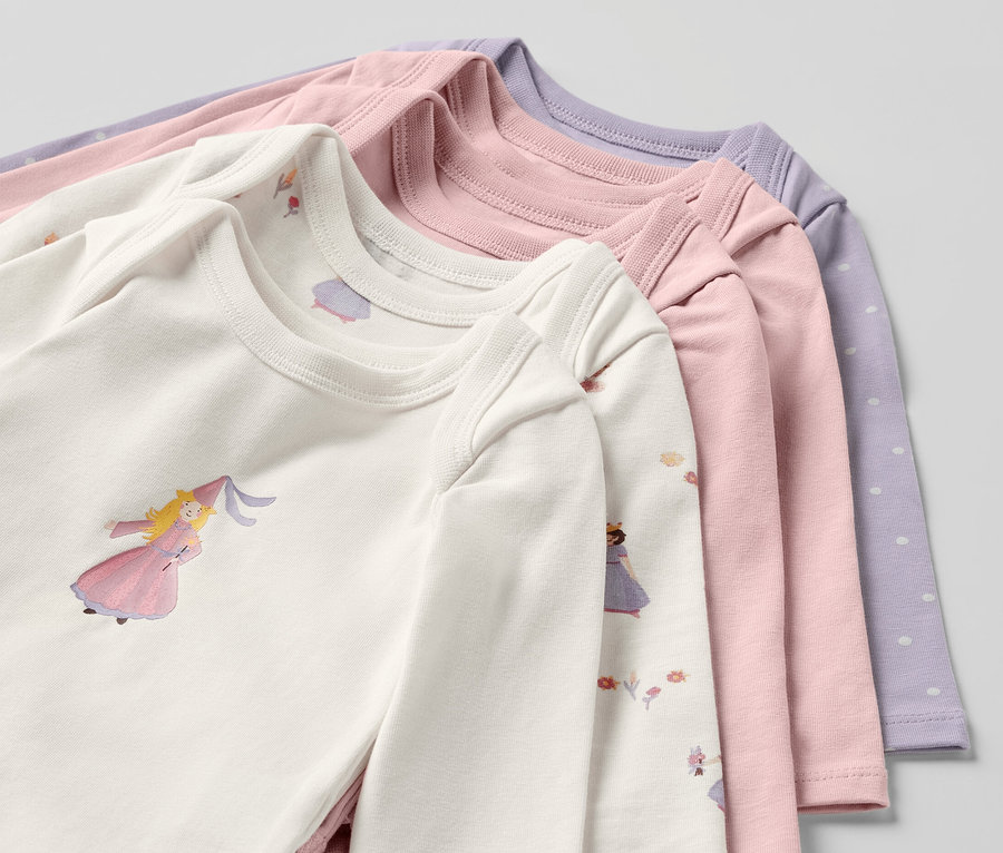 Detail záběru na pět rostoucích body pro miminka s motivem princezny.