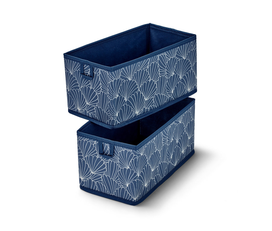 Dva střední úložné boxy do zásuvky na sobě. Boxy jsou modré s bílým vzorem.