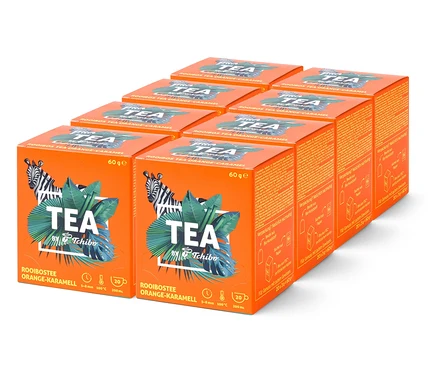 Uspořádání osmi oranžových krabic čaje s nápisem "TEA by Tchibo Rooibostee Orange-Karamell".