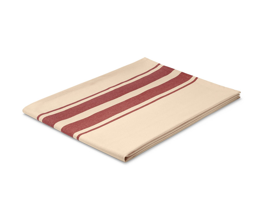 Složený béžový ubrus s vetkanými proužky.