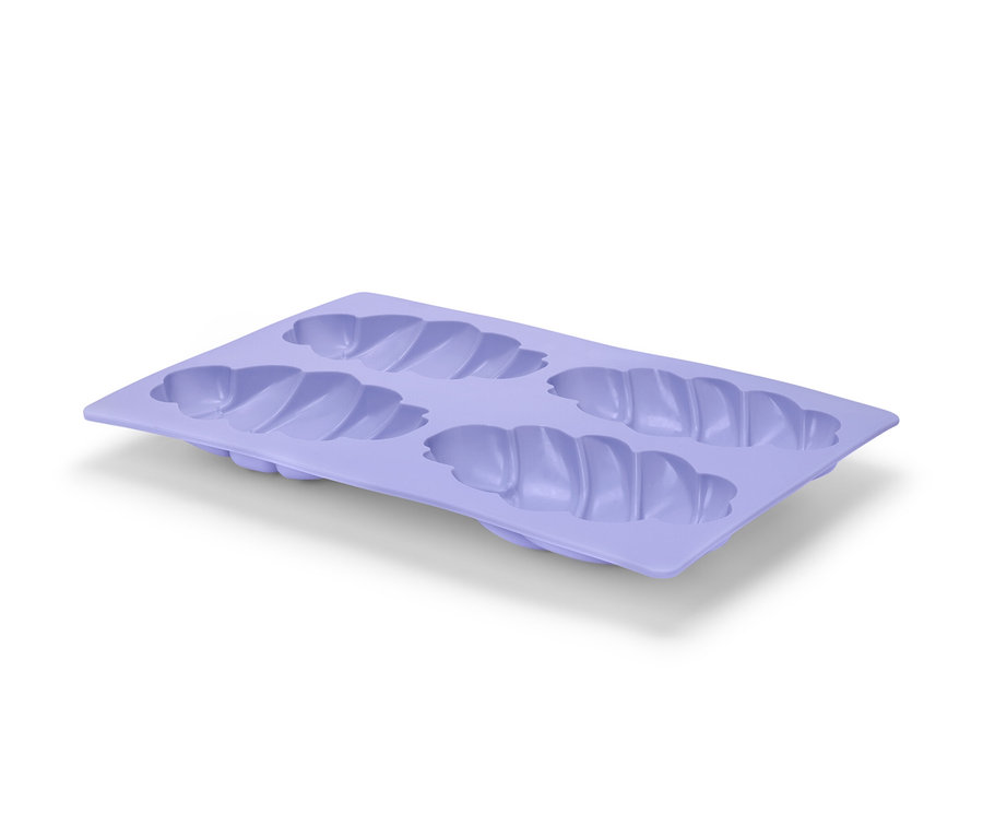 Fialová forma na pečení mini vánoček se čtyřmi prohlubněmi.