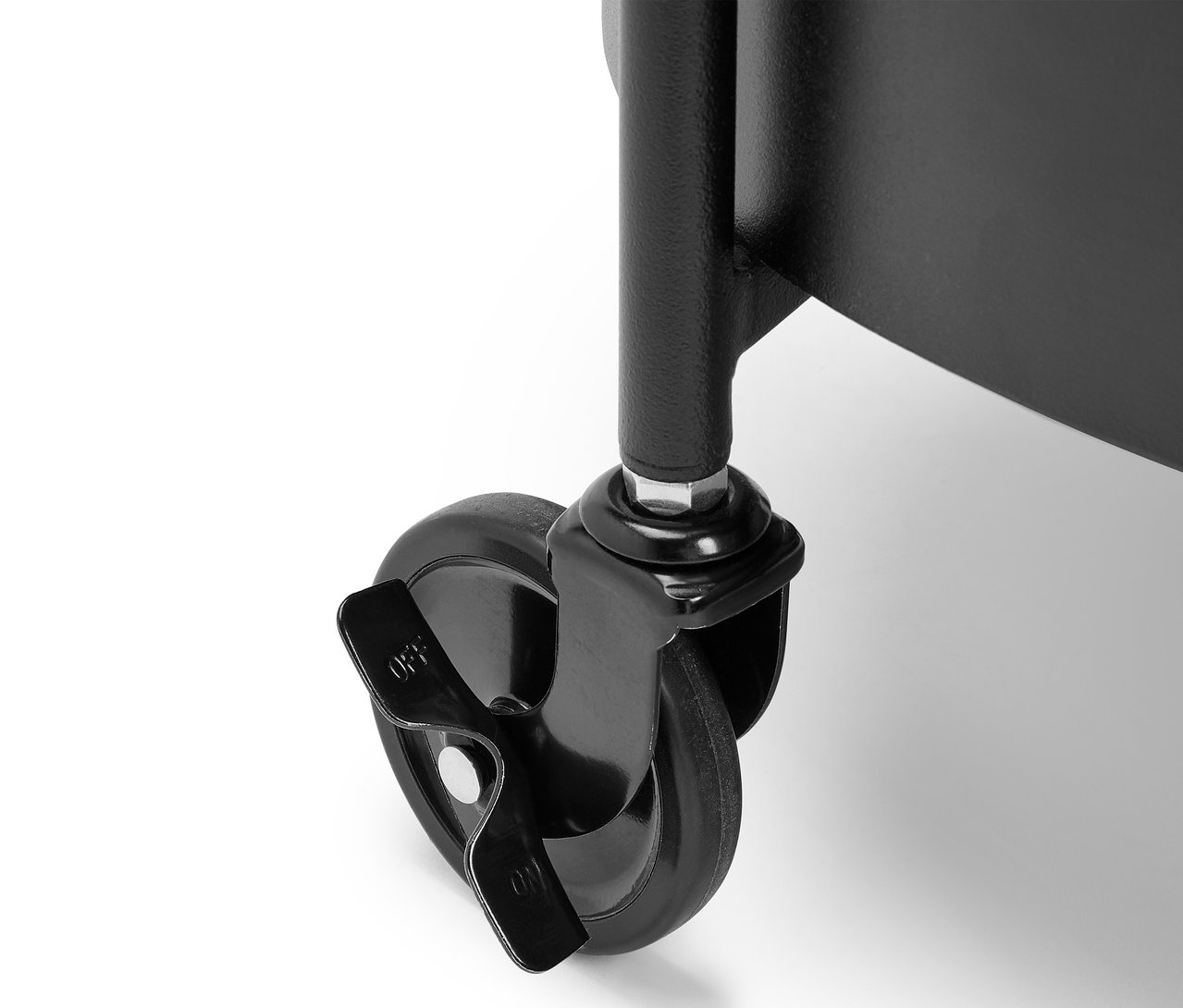 Detail of a black metal cart wheel with a brake in the off position.
