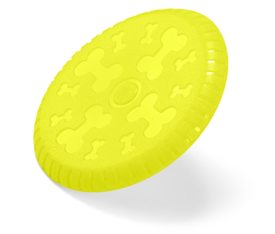 Žlutý frisbee pro psy s reliéfem kostí na bílém pozadí.