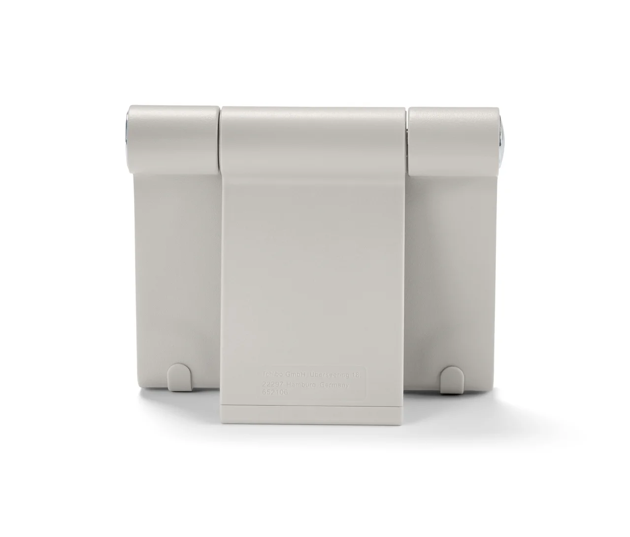 Šedý stojánek na smartphone/tablet.