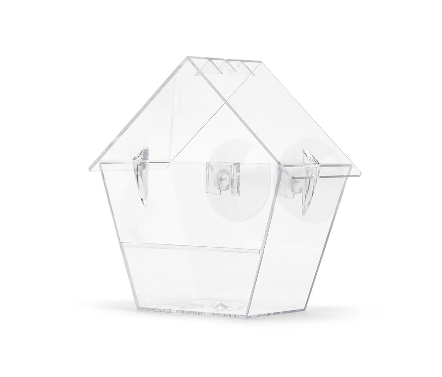 Průhledné krmítko pro ptáky na okno.